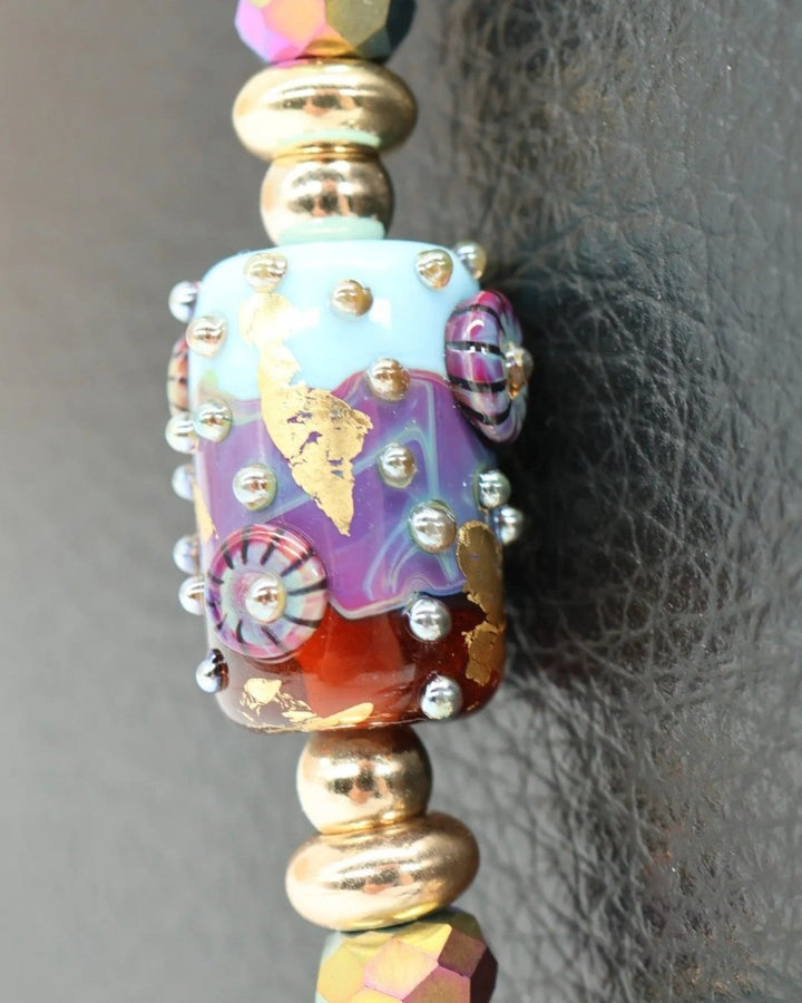 LD Keyfinder Petite Gilded Fantasy necklace with handcrafted glass bead, sky blue, topaz, gold leaf, larimar, and gold-plated accents.
