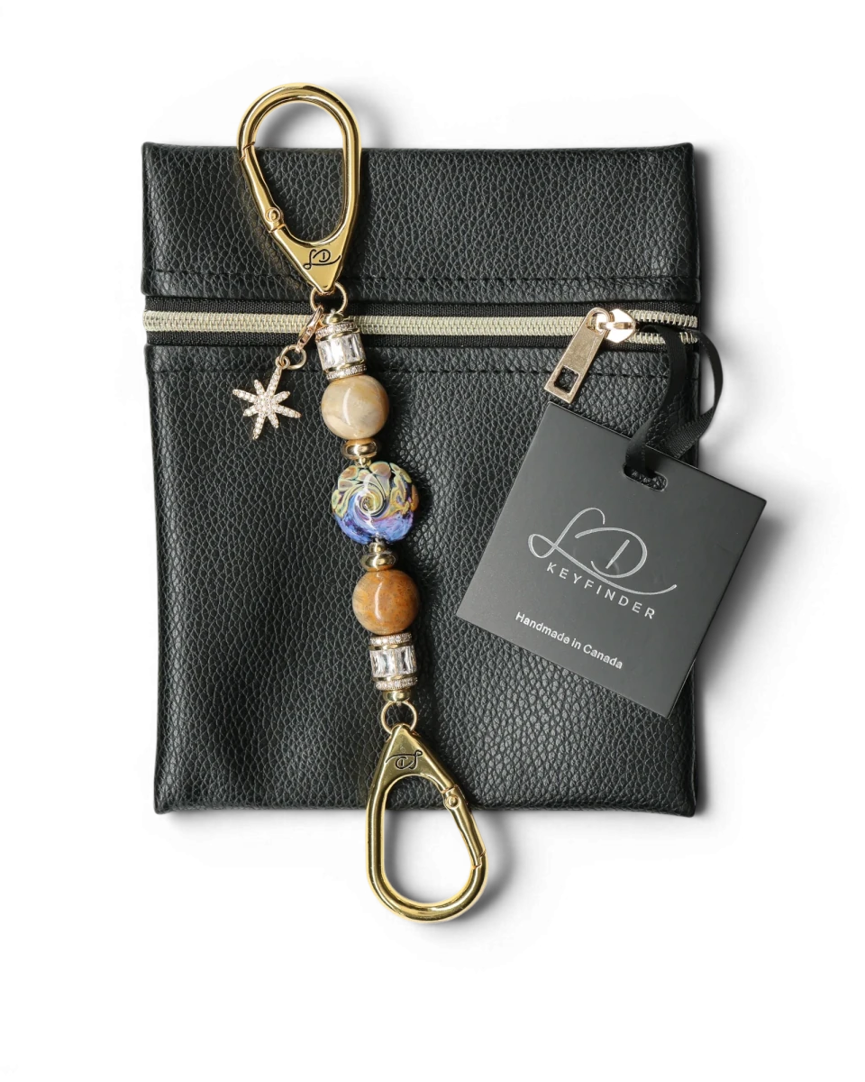 LD Keyfinder Petite Golden Nebula keychain with artisan glass bead, fossil coral, gold-plated spacers, rhinestones, and star charm.