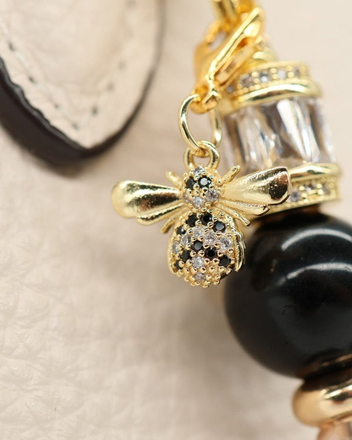 LD Keyfinder Petite Queen Bee II charm with black obsidian, gold accents, and a rhinestone bumblebee.