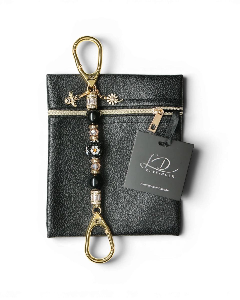 LD Keyfinder Petite Queen Bee II keychain with black obsidian beads, crystal daisy bead, gold daisy charm, and bumblebee charm.
