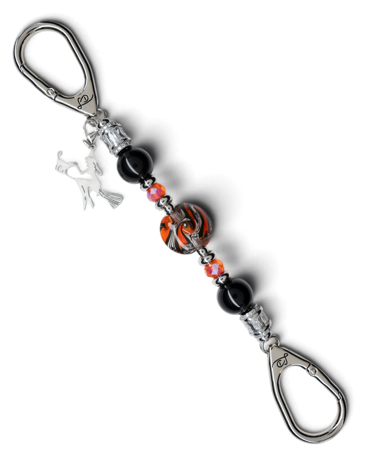LD Keyfinder Petite Spellbound featuring black obsidian, orange glass beads, platinum accents, and a witch charm.