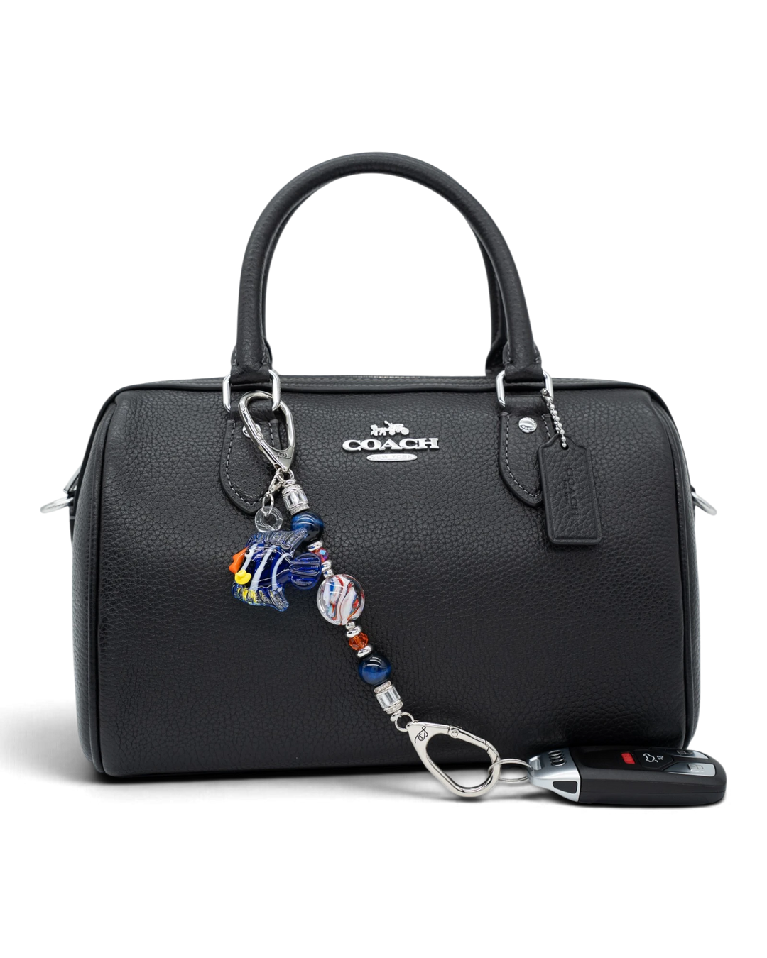 LD Keyfinder Petite Tropical Tango accessory with blue tiger eye and artisan glass beads attached to a black handbag