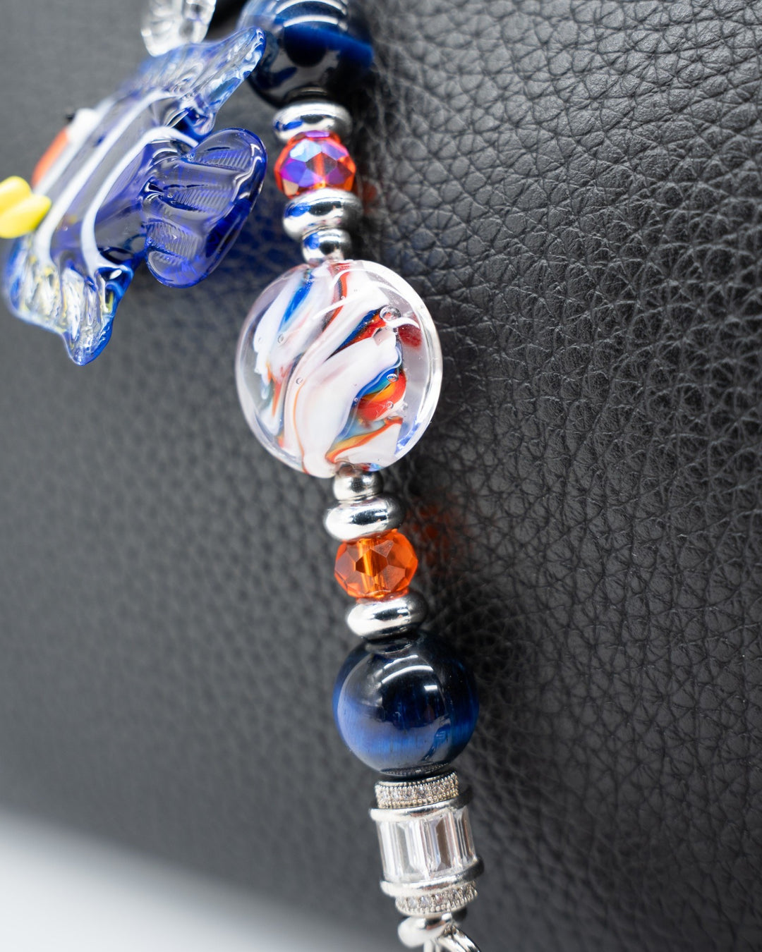 LD Keyfinder Petite Tropical Tango accessory with blue tiger eye, orange glass beads, and a removable fish charm.