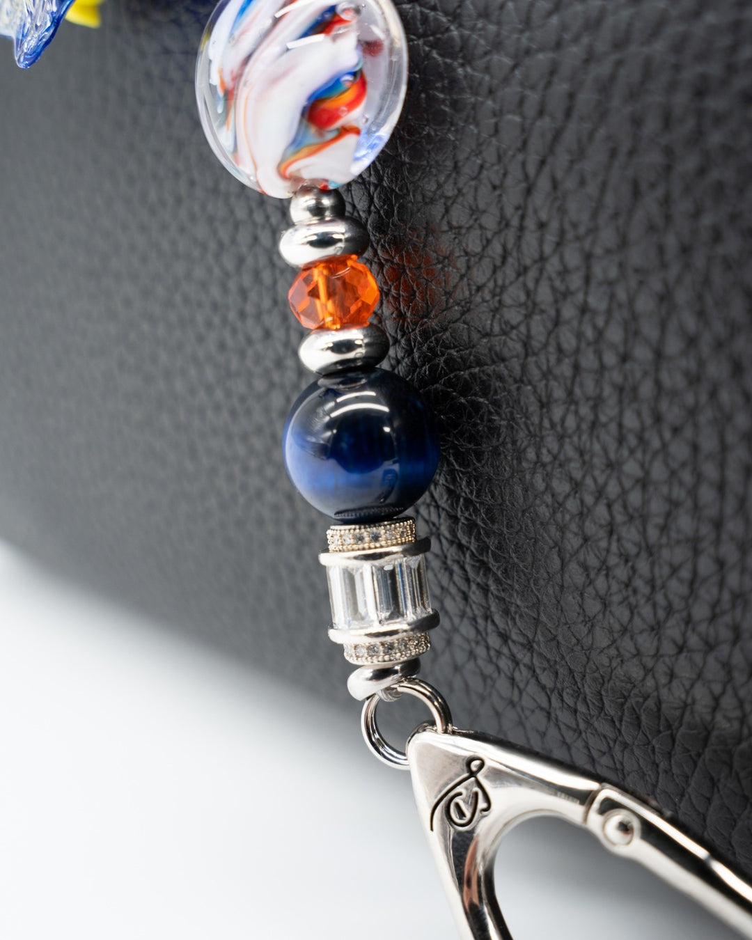 LD Keyfinder Petite Tropical Tango accessory with blue tiger eye, orange glass beads, and a removable fish charm.