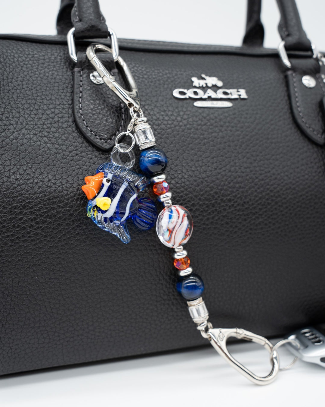 LD Keyfinder Petite Tropical Tango accessory with blue tiger eye, orange glass beads, and a removable tropical fish charm