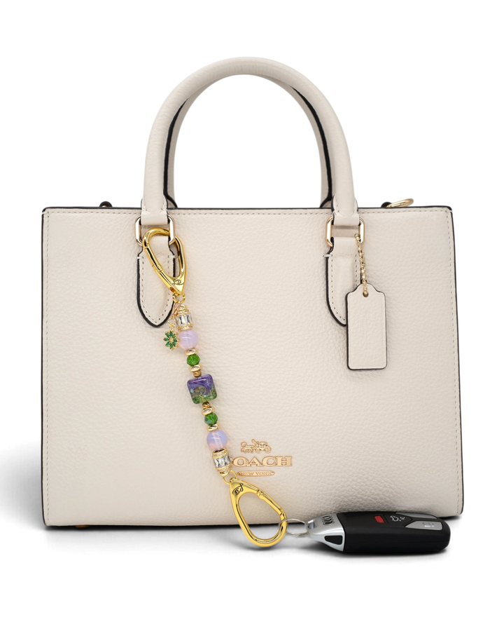 LD Keyfinder Petite Verdant Bloom accessory featuring artisan lampwork glass, pink opalite, and gold-plated flower charm