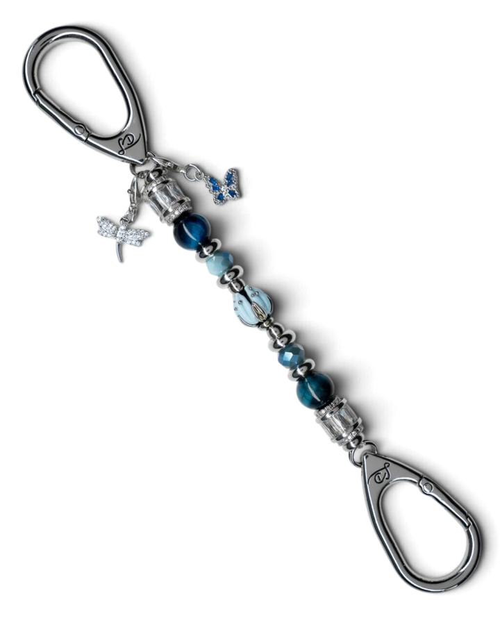 LD Keyfinder Petite Whispering Garden keychain with blue tiger eye, glass tulip, dragonfly, and butterfly charms.