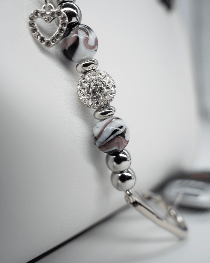 LD Keyfinder Purple Swirl Mini keychain with lampwork swirl glass beads, lilac crystal, and rhinestone heart charm.