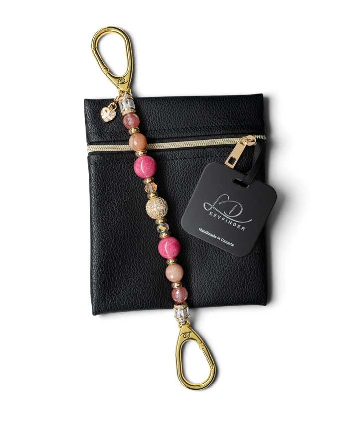 LD Keyfinder Radiant Hope beaded keychain with pink gemstones, gold pavé centerpiece, and pink ribbon heart charm.