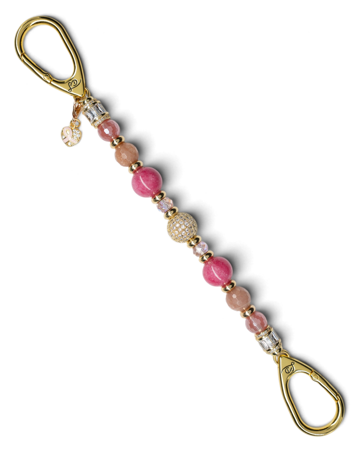LD Keyfinder Radiant Hope beaded keychain with pink gemstones, gold-plated pavé centerpiece, and pink ribbon heart charm.