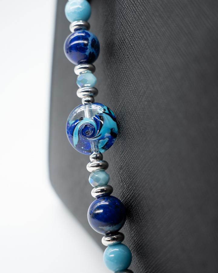 LD Keyfinder Sapphire Allure beaded accessory featuring artisan glass, blue jasper, larimar, and platinum-plated accents.