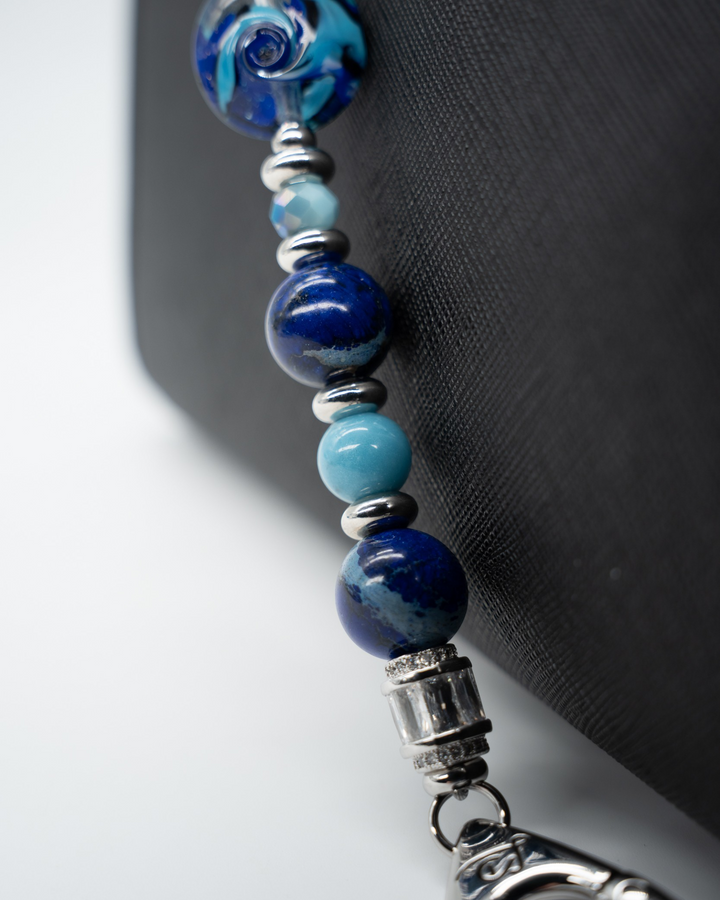 LD Keyfinder Sapphire Allure beaded accessory featuring blue jasper, larimar, and a handcrafted sapphire glass bead.