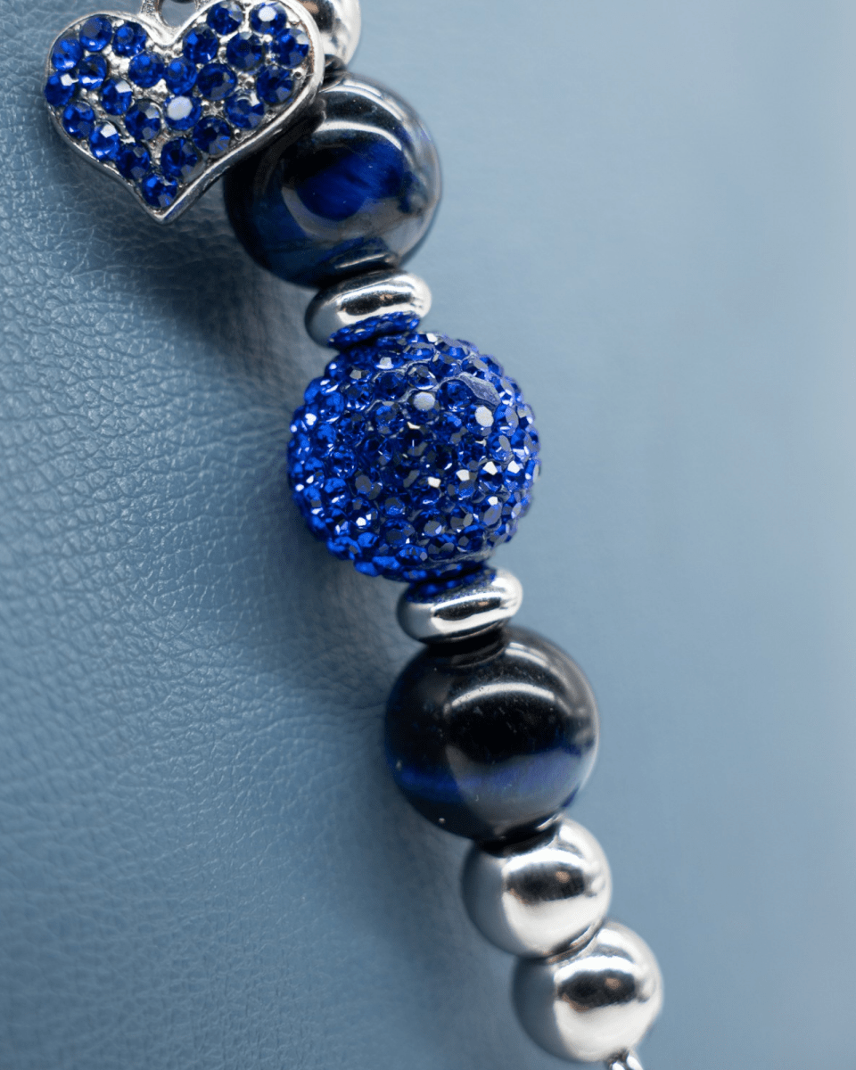 LD Keyfinder Sapphire Shimmer-Mini featuring dark blue tiger eye beads, sapphire-blue crystal bead, and heart charm.