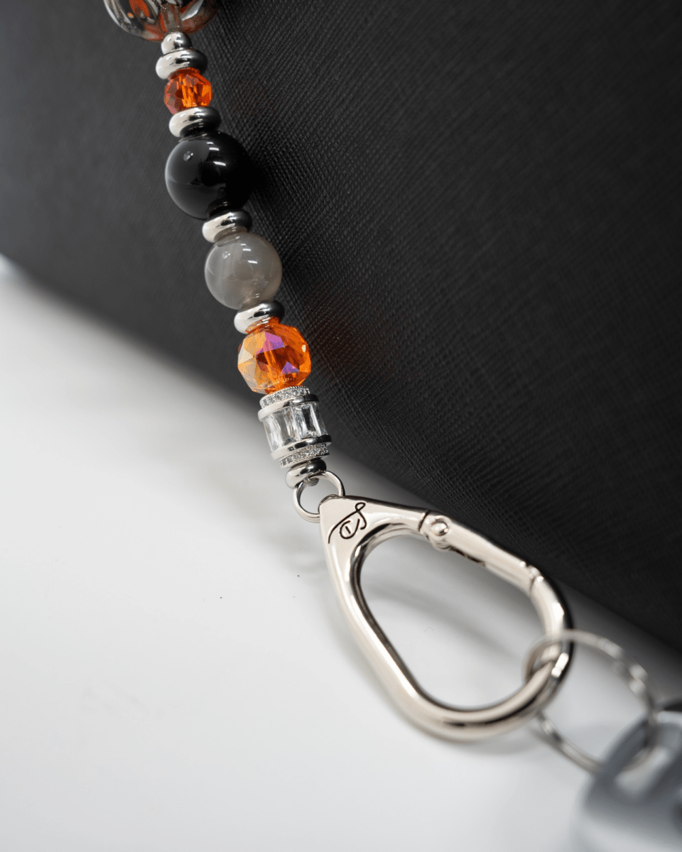 LD Keyfinder Spellbound Halloween accessory with black obsidian, moonstone, orange glass beads, and witch charm.