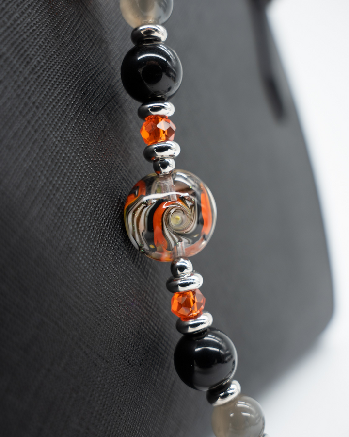 LD Keyfinder Spellbound Halloween accessory featuring black obsidian, moonstone, orange glass beads, and a witch charm.