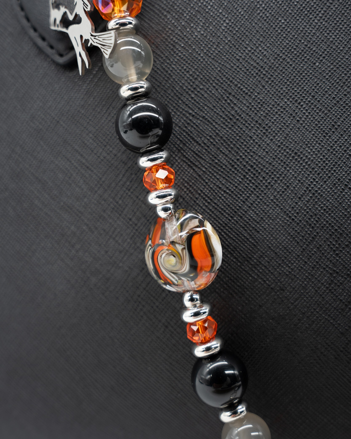 LD Keyfinder Spellbound Halloween accessory featuring black obsidian, moonstone, orange glass beads, and a witch charm.