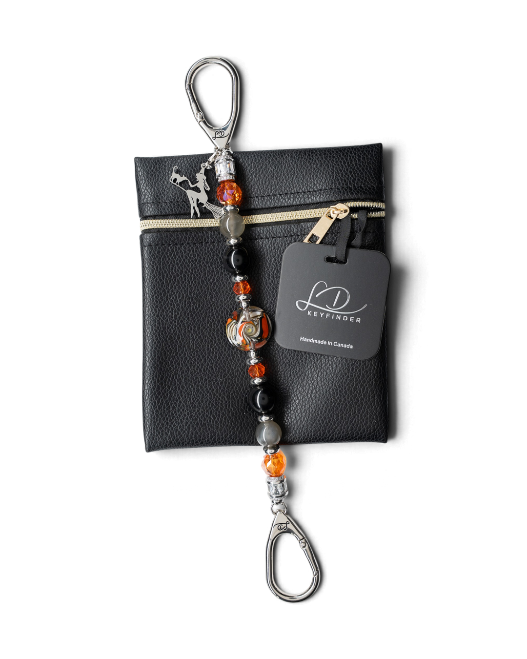 LD Keyfinder Spellbound Halloween beaded keychain with obsidian, moonstone, orange glass, and a witch charm on a pouch.