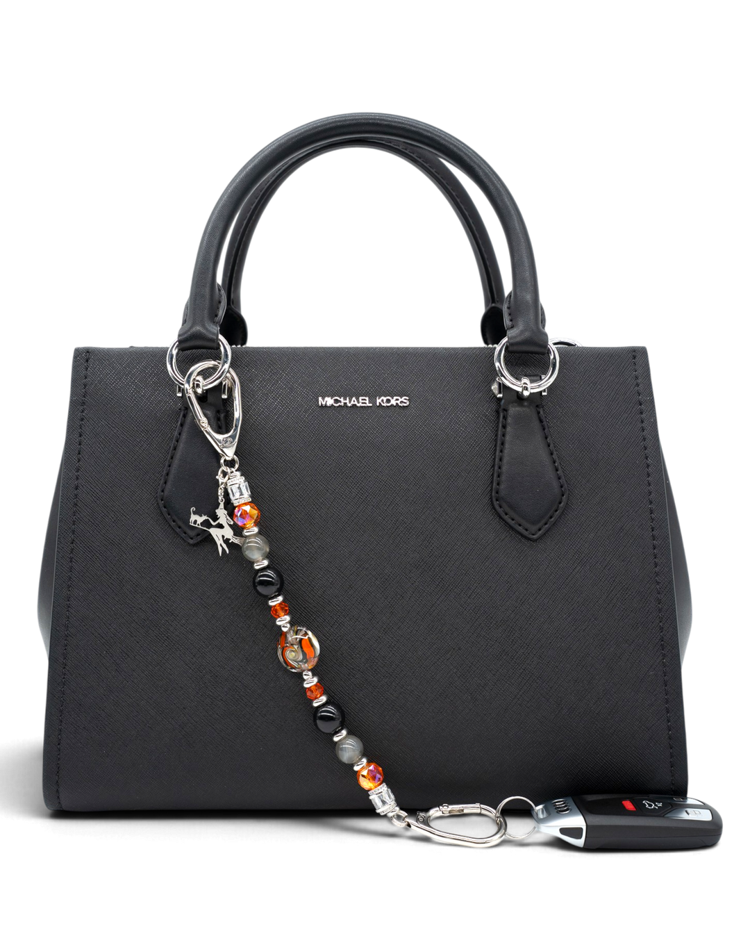 LD Keyfinder Spellbound Halloween accessory with obsidian, moonstone, and orange glass beads attached to a black bag.