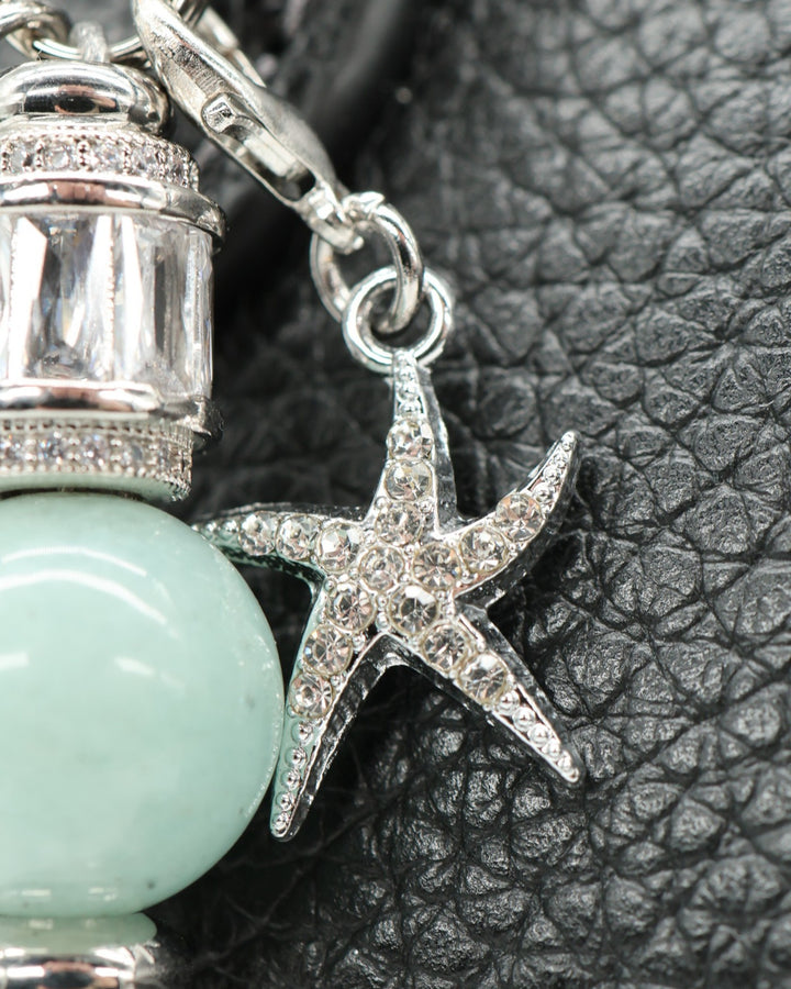 LD Keyfinder Petite Caribbean Pearl featuring a rhinestone starfish charm, aqua jade, and white glass beads.