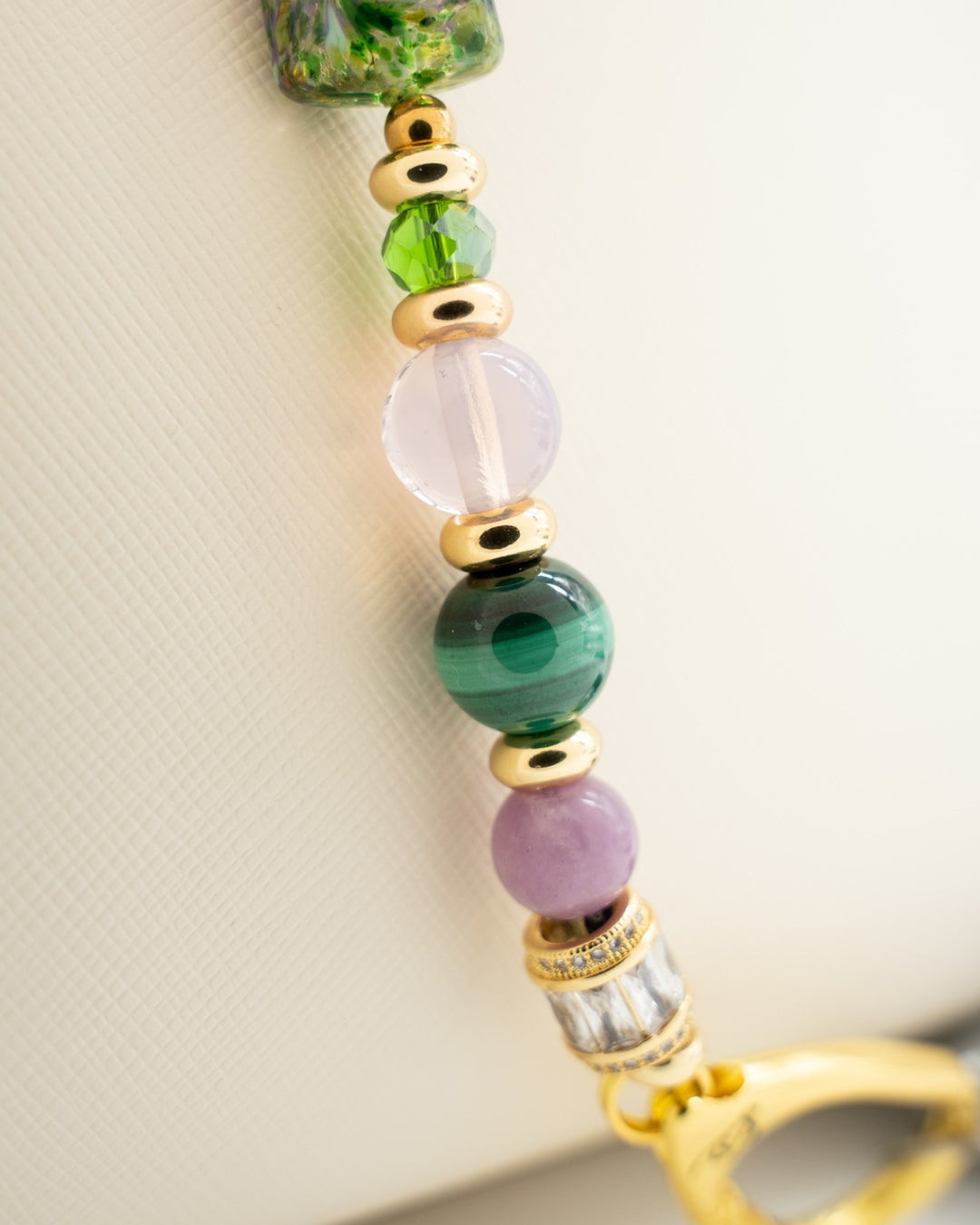 LD Keyfinder Verdant Bloom beaded accessory featuring artisan lampwork glass, malachite, opalite, and gold accents.