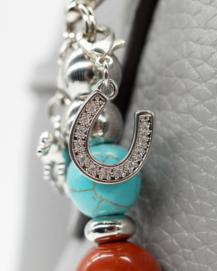 Platinum-plated horseshoe charm