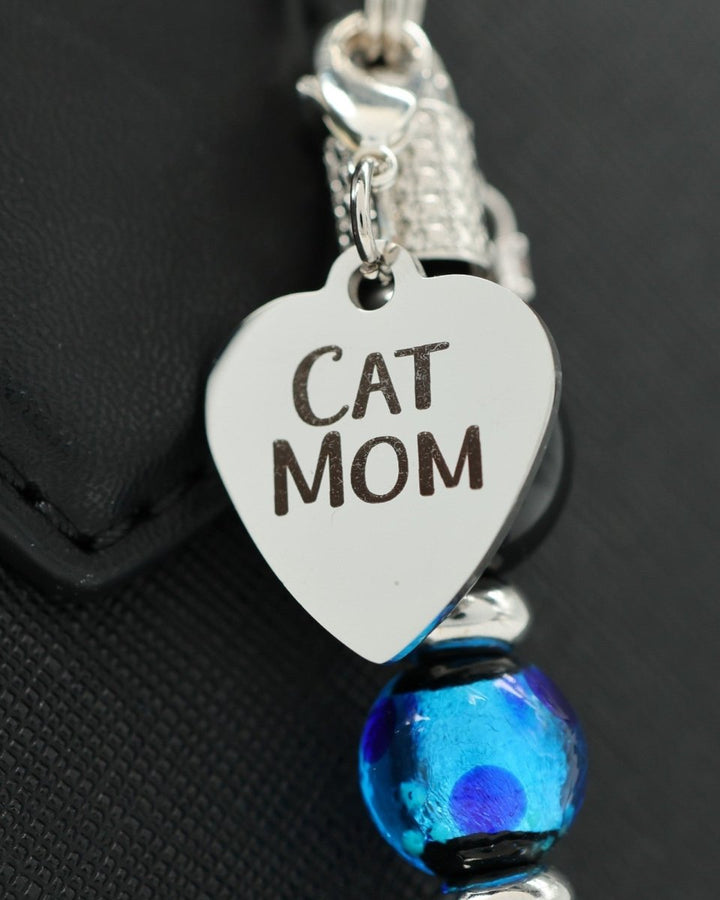 LD Keyfinder Whisker Dreams keychain featuring a heart-shaped Cat Mom charm, blue foil glass bead, and black obsidian.
