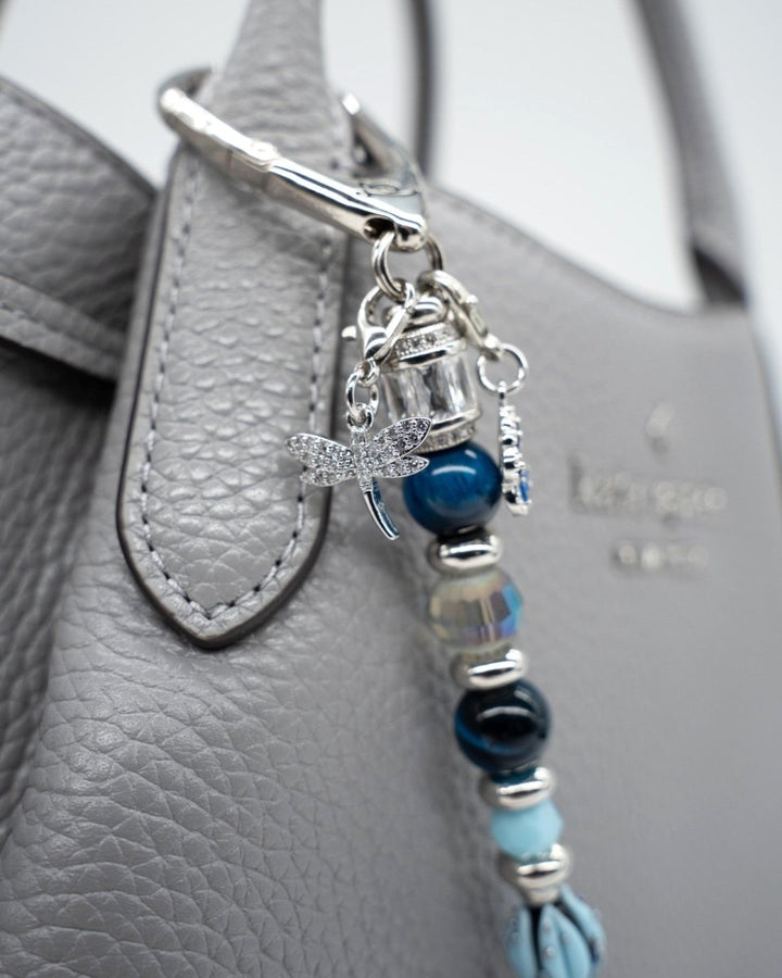 LD Keyfinder Whispering Garden accessory with blue tiger eye beads, glass tulip, and rhinestone dragonfly charm