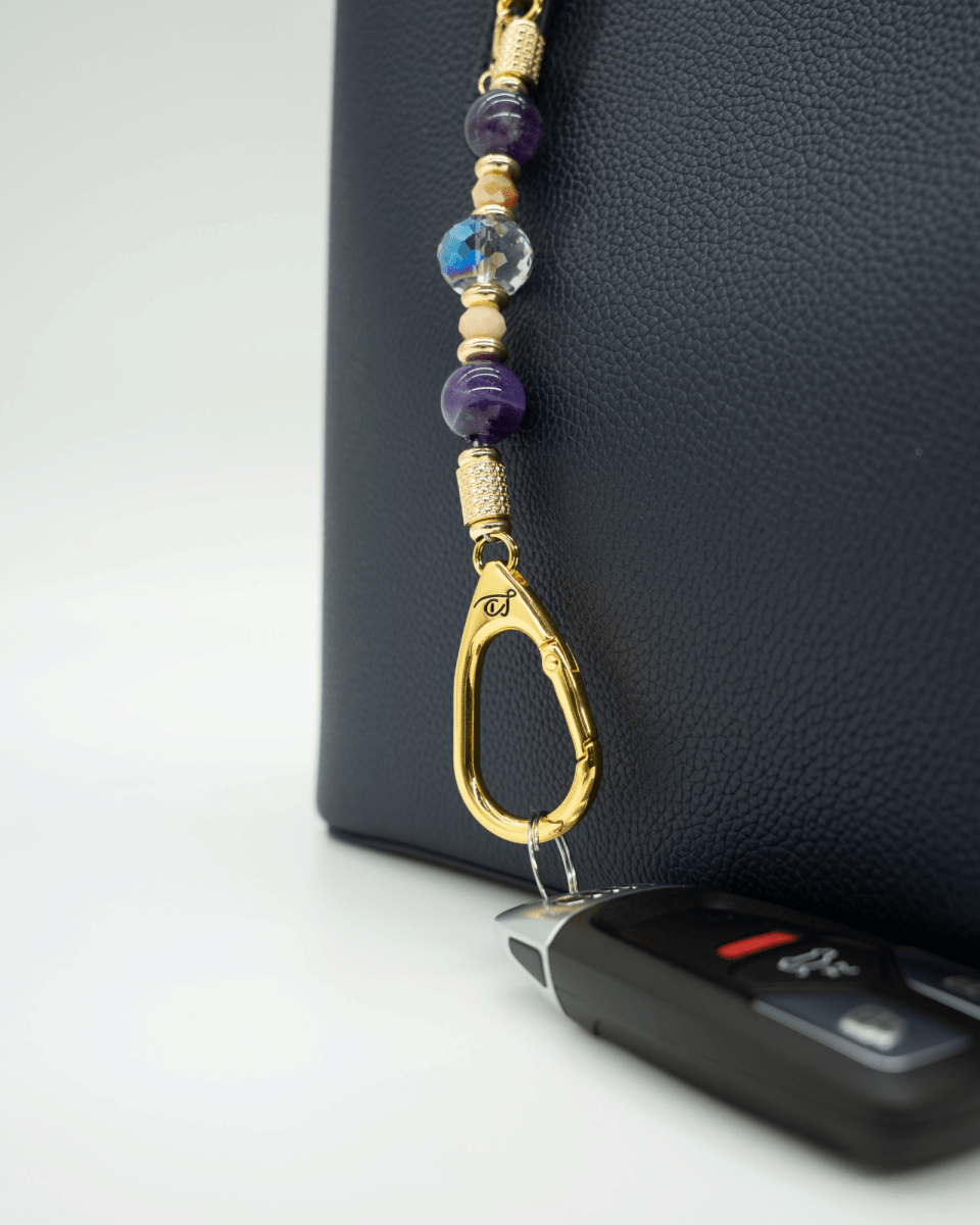 LD Keyfinder Whoo's There-Mini featuring amethyst, peach jade, and indigo crystal beads with a gold owl charm.