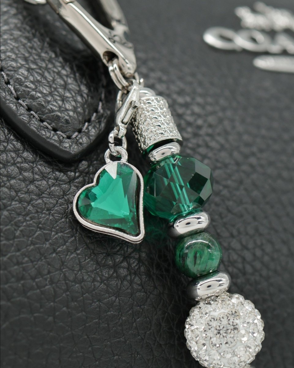 Green faceted glass heart charm