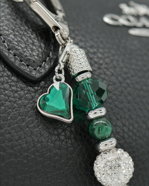 Green faceted glass heart charm