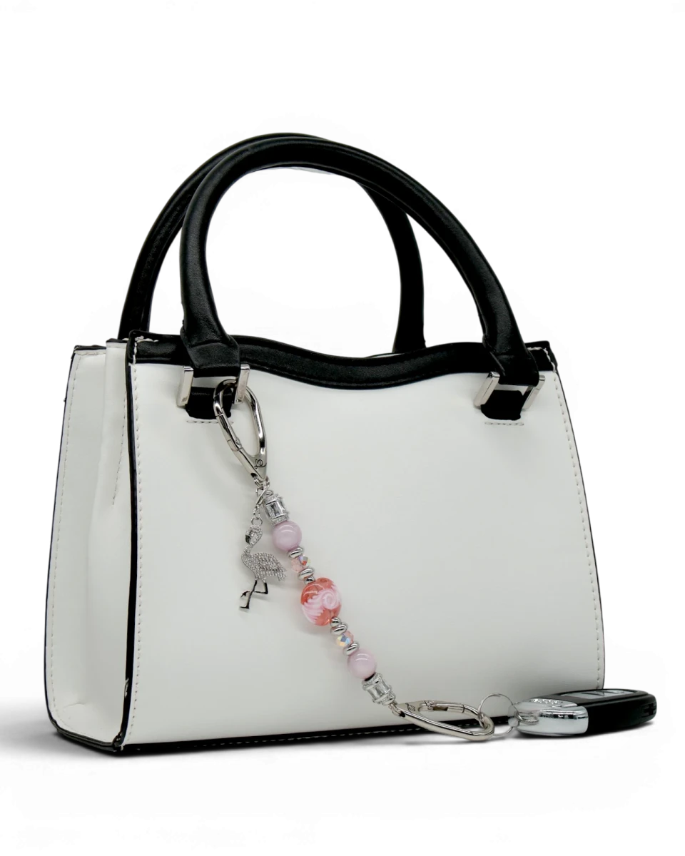 LD Keyfinder Petite Flamingo Blush keychain with pink glass beads and rhinestone flamingo charm attached to a white handbag.