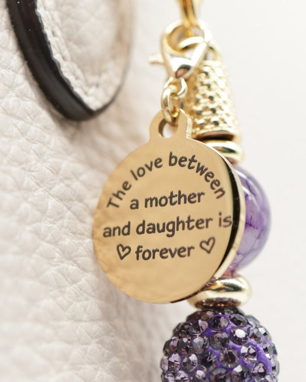 Polished stainless mother daughter charm